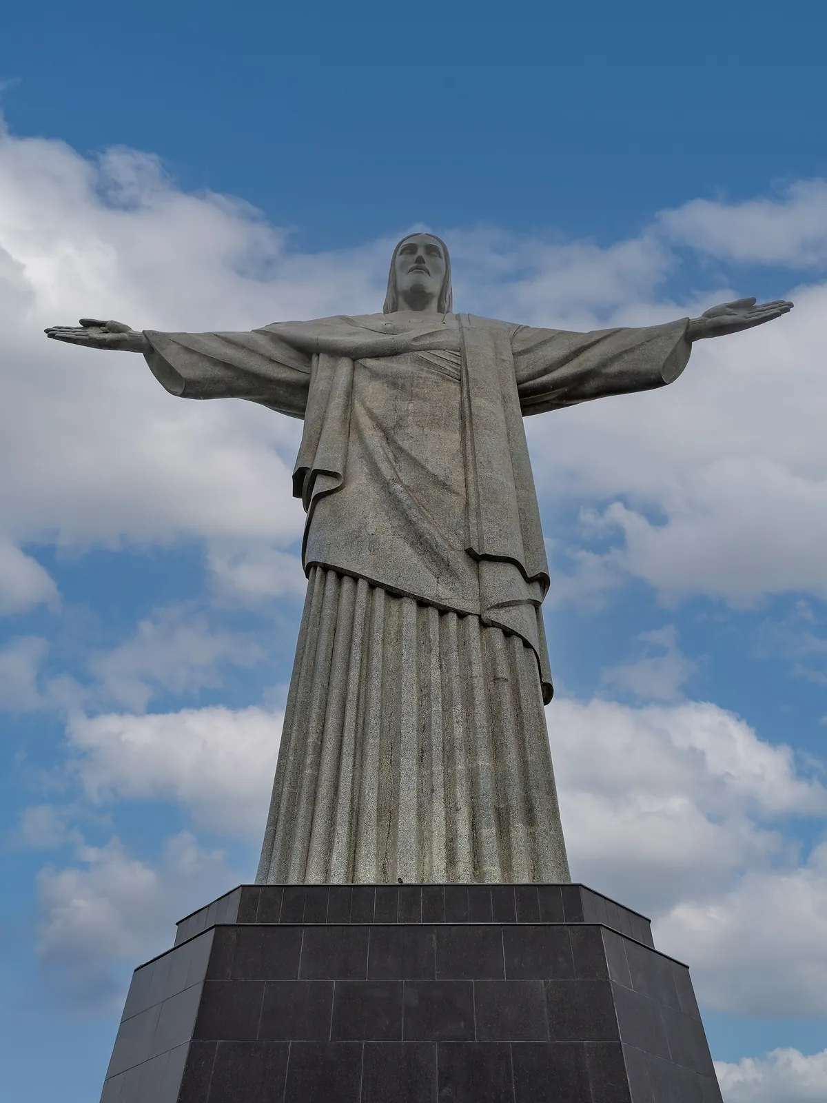 Christ the Redeemer statue against a blue sky